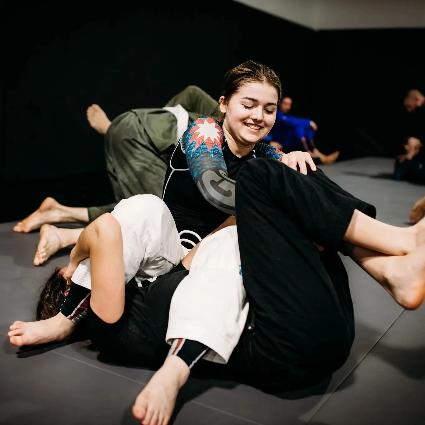 Women's Brazilian Jiu-Jitsu class training together at Infinum BJJ in Brantford Ontario